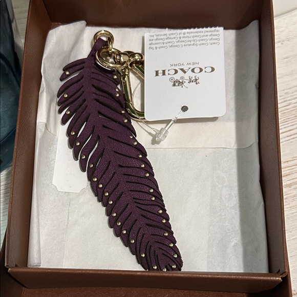Coach Dark Plum Feather Motif Keychain - Picture 1 of 12